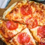 Homemade pizza dough recipe that's easy and delicious. A flavorful dough you can make in bulk and just pull out of the freezer when you're ready to use it. #bakingpizza #pizzadough #pizzadoughrecipe #homeamdepizza #italianpizzadough #bestpizzadough #longbournfarm #homemademeal #homeamdedinner #cookingfromscratch #scratchcooking #homecooked #homecookedmeal #homecookeddinner #simplefood #homegrownfood #fromscratch