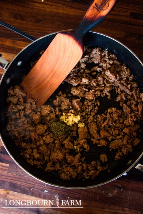 ground meat and seasonings in a skillet