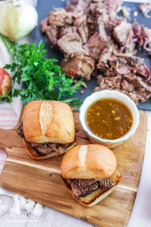 This slow cooker Italian beef sandwich recipe is a family favorite and a crowd pleaser every time. Get an easy start on dinner today and use the leftovers all week long! #longbournfarm #homemademeal #homeamdedinner #cookingfromscratch #scratchcooking #homecooked #homecookedmeal #homecookeddinner #simplefood #homegrownfood #fromscratch #roastbeef #italianroastbeef #roastbeefsandwich #italianbeefsandwich #italianbeef #beefsandwich #slowcooker #crockpot #slowcookermeal #crockpotmeal
