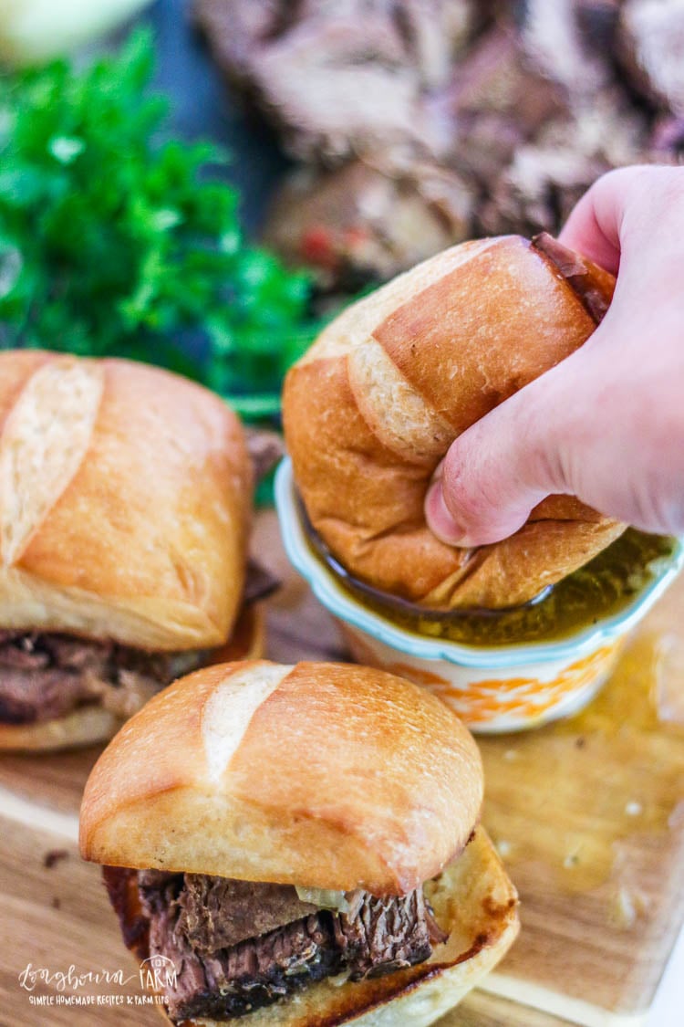 This slow cooker Italian beef sandwich recipe is a family favorite and a crowd pleaser every time. Get an easy start on dinner today and use the leftovers all week long! #longbournfarm #homemademeal #homeamdedinner #cookingfromscratch #scratchcooking #homecooked #homecookedmeal #homecookeddinner #simplefood #homegrownfood #fromscratch #roastbeef #italianroastbeef #roastbeefsandwich #italianbeefsandwich #italianbeef #beefsandwich #slowcooker #crockpot #slowcookermeal #crockpotmeal