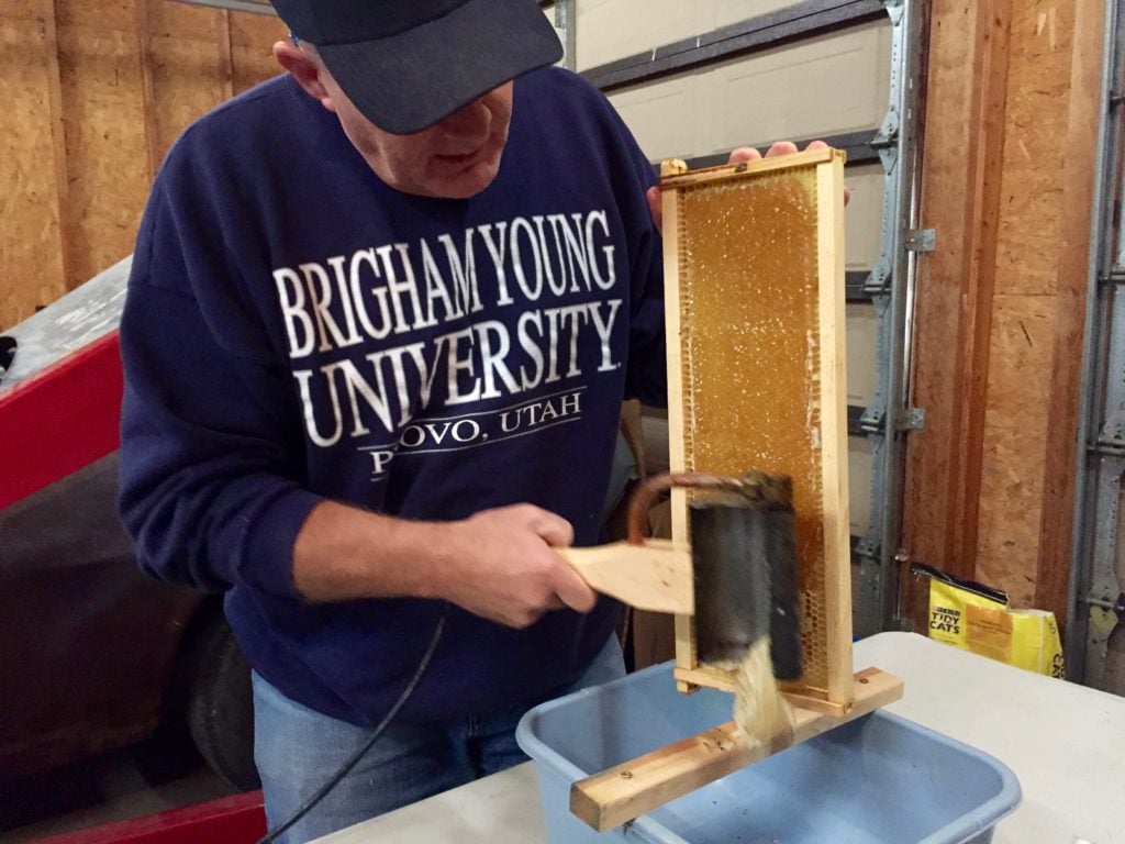 Dad uncapping a frame.