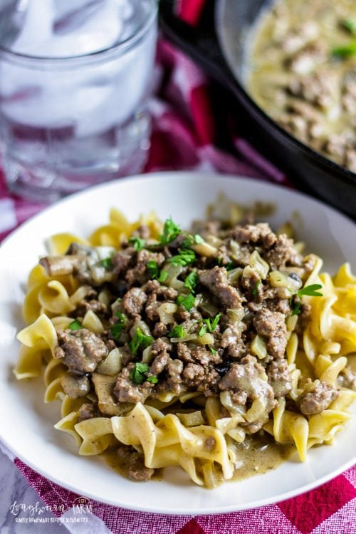 Close-up of egg noodles topped with homemade easy beef stroganoff.