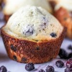 Close-up, side view of a whole easy blueberry muffin.