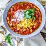This hearty homemade chili recipe is sure to be a hit at your next family dinner. This easy chili is packed full of meat, beans, and tomato flavor! #chilirecipe #chilirecipeeasy #chilirecipebest #homemeadechili #homemadechilirecipe