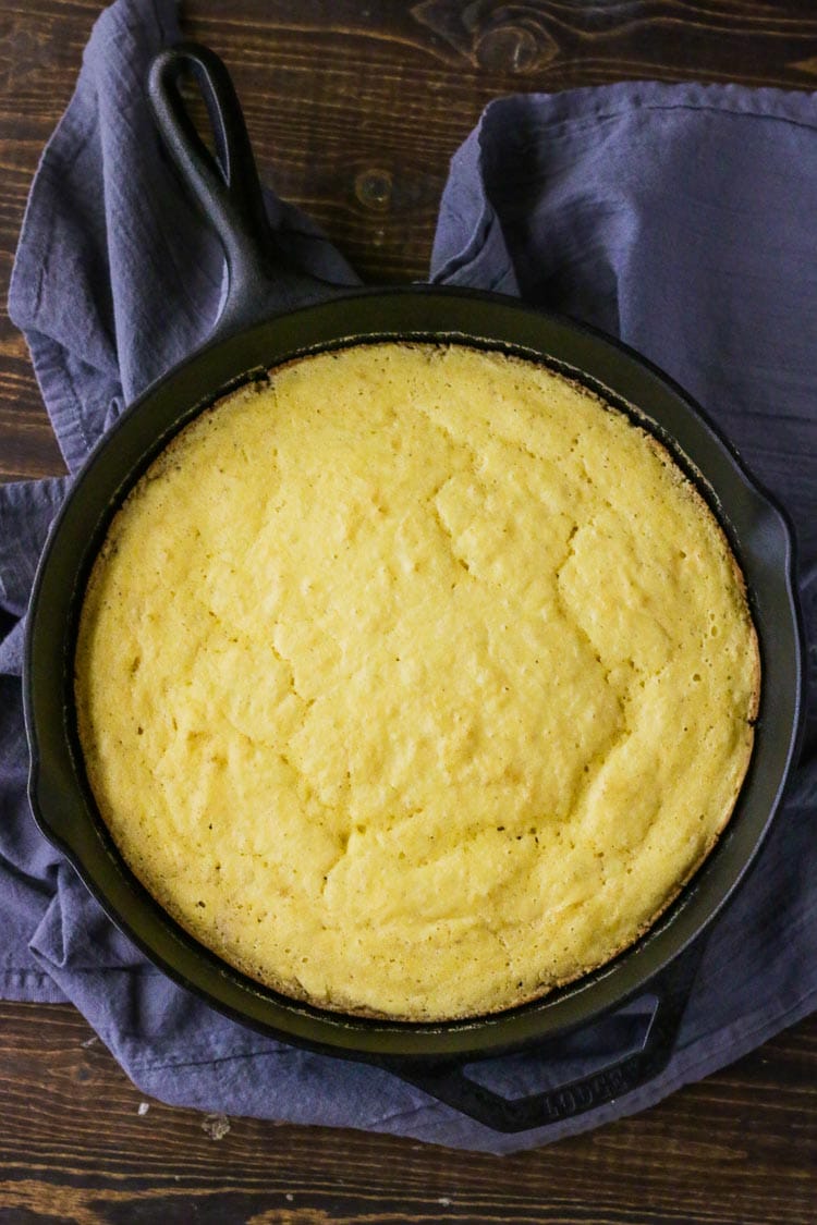 Looking for a moist cornbread recipe? Look no further! This cornbread is perfect every time with a crispy, golden crust. #skilletcornbreadrecipe #skilletcornbreadcastiron #buttermilkcornbread #buttermilkcornbreadrecipe #moistcornbread #moistcornbreadrecipe