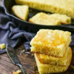 Looking for a moist cornbread recipe? Look no further! This cornbread is perfect every time with a crispy, golden crust. #skilletcornbreadrecipe #skilletcornbreadcastiron #buttermilkcornbread #buttermilkcornbreadrecipe #moistcornbread #moistcornbreadrecipe