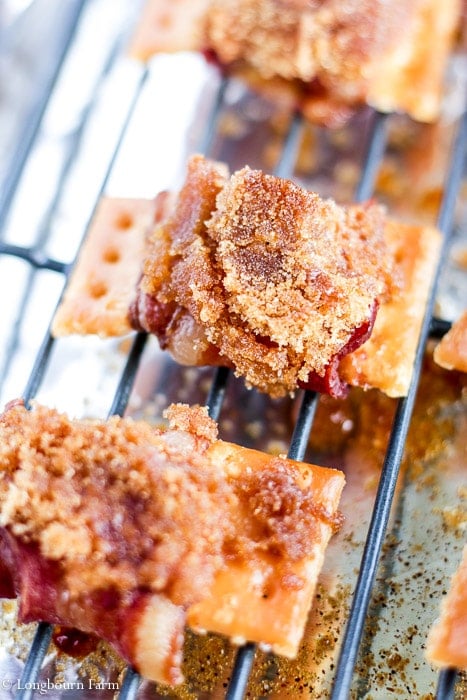 Close-up of cracker bacon appetizer with caramelized brown sugar on top. 