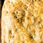 Baked homemade focaccia recipe in the pan.