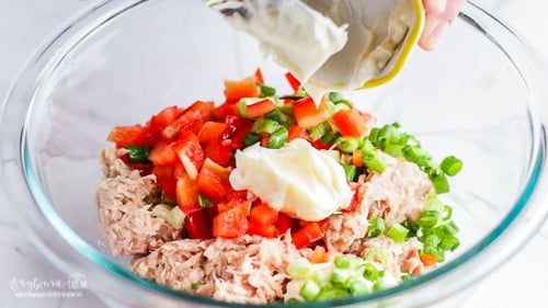 Adding mayo to the mix for easy tuna melt recipe.
