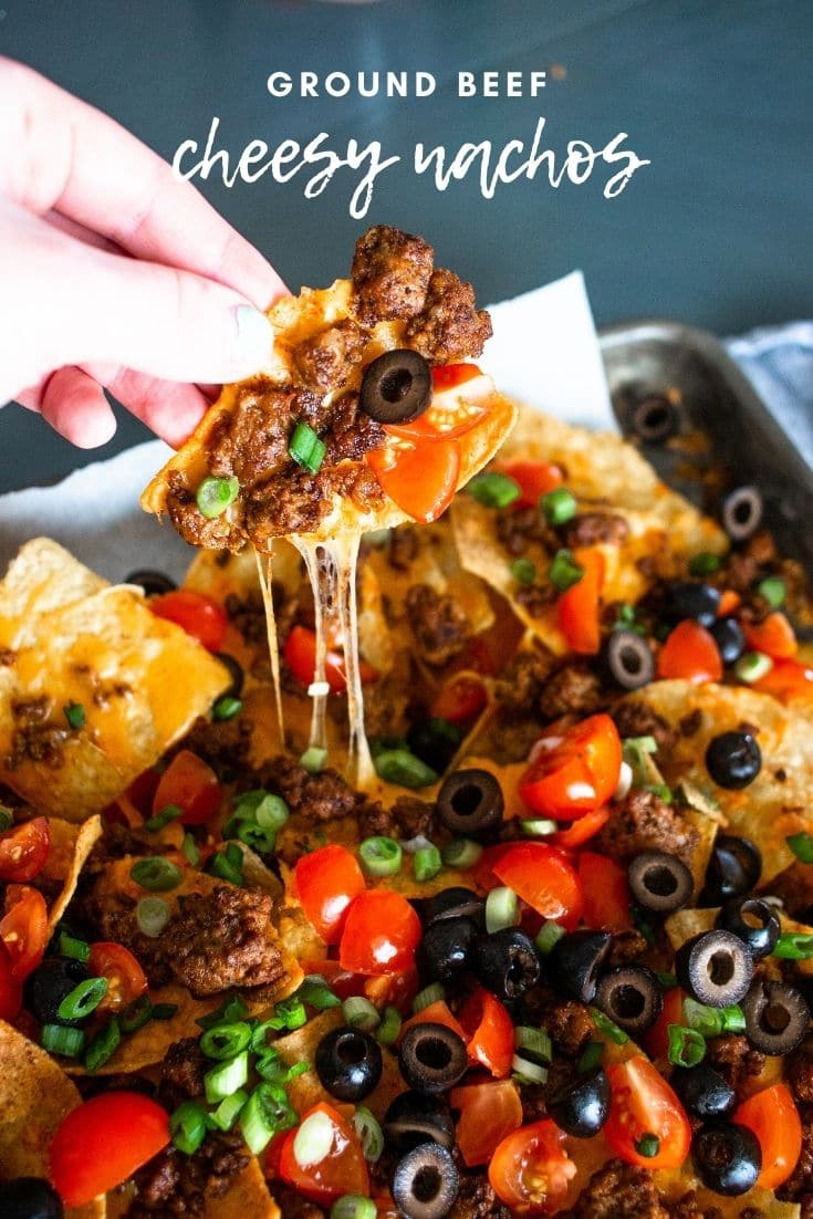 Ground beef nachos are a tasty appetizer, snack, or meal. Loaded with your favorite cheese and toppings, this dish is simple and tasty. Perfect for a fiesta-inspired plateful of awesome.