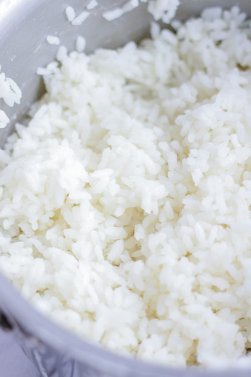Close-up of white rice recipe finished cooking in the pot. 