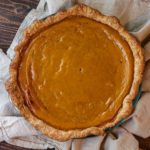 Learn how to make homemade pumpkin pie that tastes amazing and turns out every time. Step-by-step instructions, pictures, and a video! #pumpkinpierecipe #homemadepumpkinpie #homemadepumpkinpierecipe #homemadepumpkinpiecrust #holidaypierecipes #holidaypies