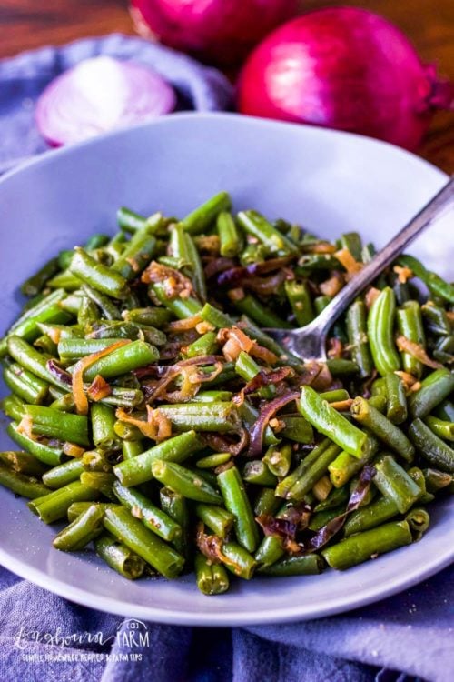 Learning how to cook frozen green beans makes having a veggie side dish for dinner easy! Simple and flavorful and done in minutes. #frozengreenbeans #frozengreenbeanrecipes #howtocookfrozengreenbeans #frozengreenbeanrecipe #frozengreenbeansauteed