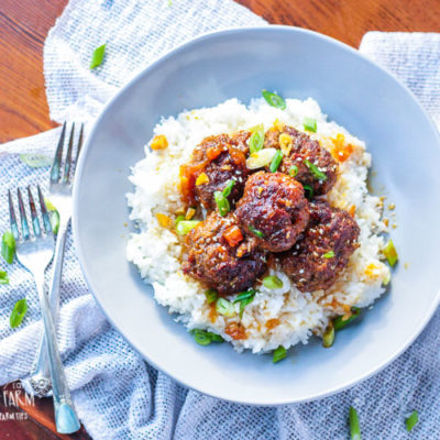 Teriyaki meatballs made in the slow cooker, served over rice.