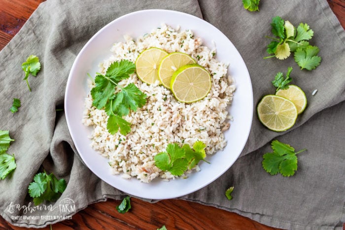 Cilantro lime rice in a bowl on a towel. 