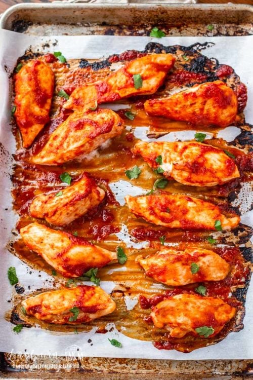 Oven baked BBQ chicken is a quick and filling dinner that the entire family will love! Use homemade or store bought sauce and have dinner ready quick! #ovenbakedchicken #bbqchicken #ovenbakedbbqchicken #bbqchicken #bbqchickeneasy #bbqchickenquick #bbqchickenfast #fastdinner #quickdinner #easydinnerrecipe