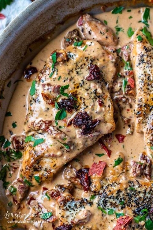 Creamy Tuscan chicken is easy to make and packed with flavor! Sun-dried tomatoes, basil, and a creamy sauce make this quick dish irresistible. #tuscanchicken #tuscanchickenskillet #tuscanchickeneasy #tuscanchickenrecipe #tuscanchickencreamy #tuscanchickensundriedtomatoes #tuscanchickenalfredo