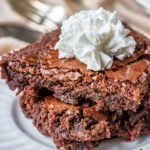 If you need a quick, delicious, and easy dessert when you're out camping, make brownies! Step-by-step directions for baking them in a dutch oven. #dutchoven #castiron #castironcooking #brownies #dutchovenbrownies #brownierecipe #dutchovenrecipe #dutchovencooking