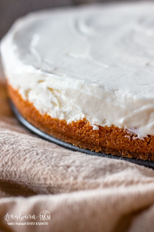 No bake cheesecake made without sweetened condensed milk set and ready to slice.