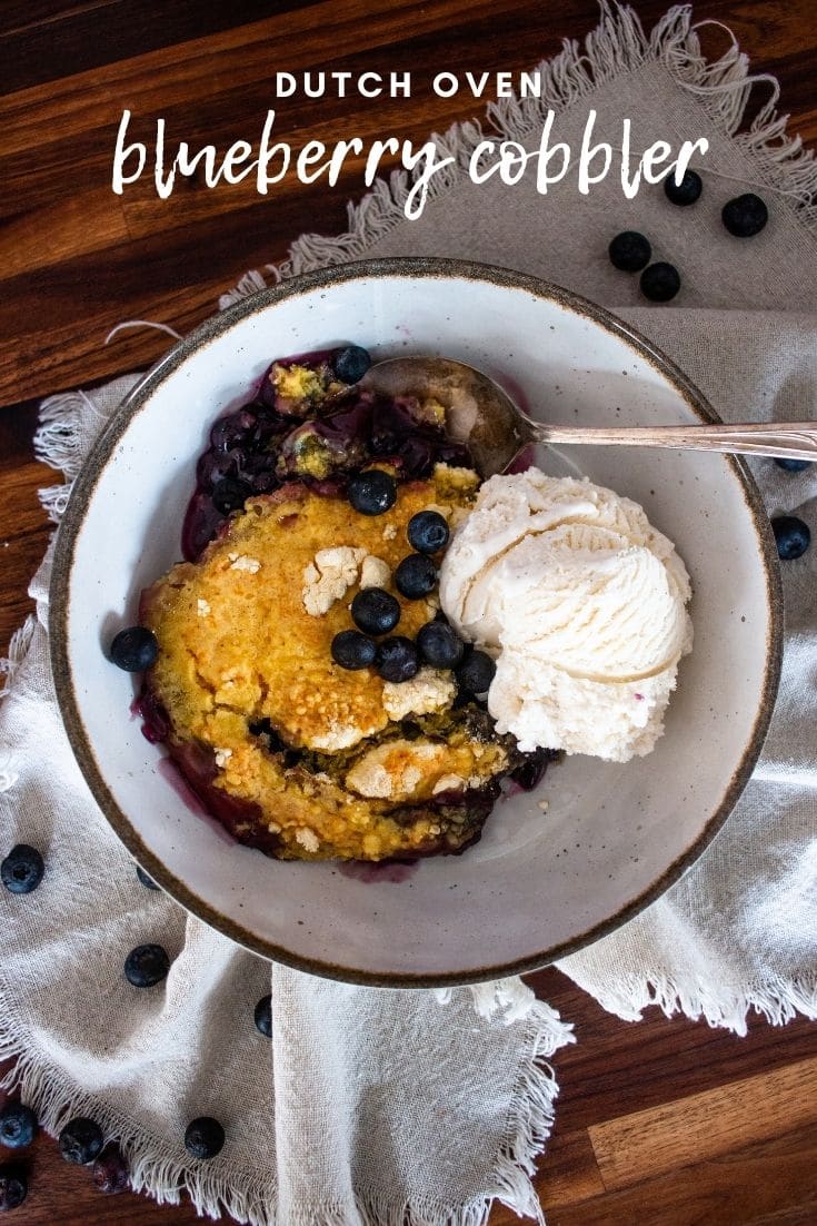 Dutch oven blueberry cobbler only uses 3 ingredients and is so flavorful and delicious! Get the instructions for baking with coals or in the oven. #blueberry #cobbler #dutchoven #castiron #blueberrycobbler #dutchovencobbler #dutchovenblueberrycobbler #easycobbler #threeingredientcobbler #spritecobbler #cakemixcobbler #cakemixcobblerrecipe #blueberrycobblerrecipe