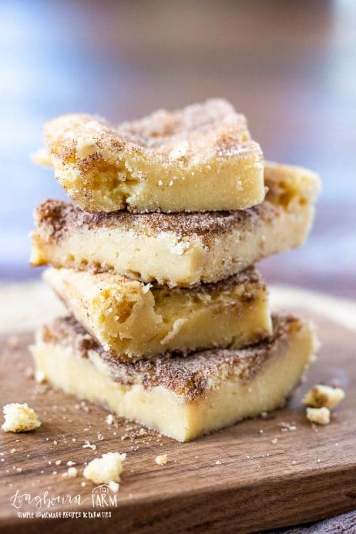 Side view of stacked slices of snickerdoodle bars.