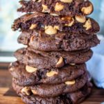 chocolate peanut butter chip cookieswith top cookie split in half to show the insides