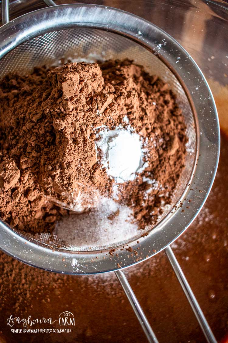 sifting in the cocoa powder and dry ingredients