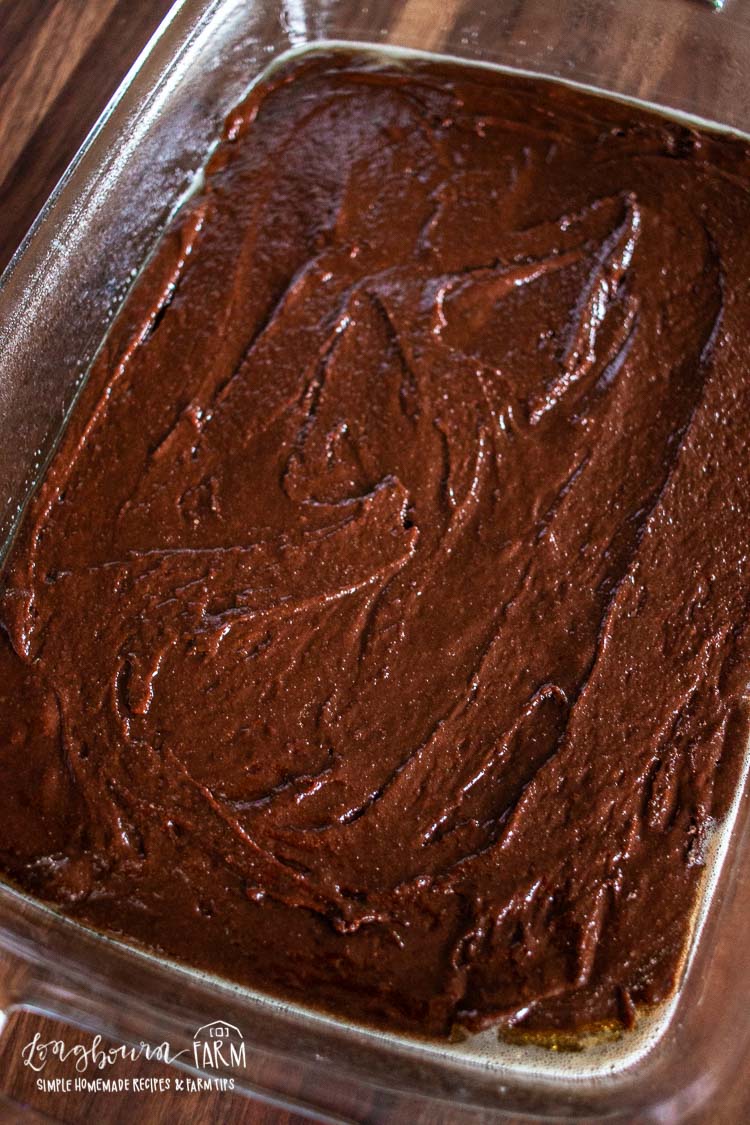 a pan of freshly poured brownie batter