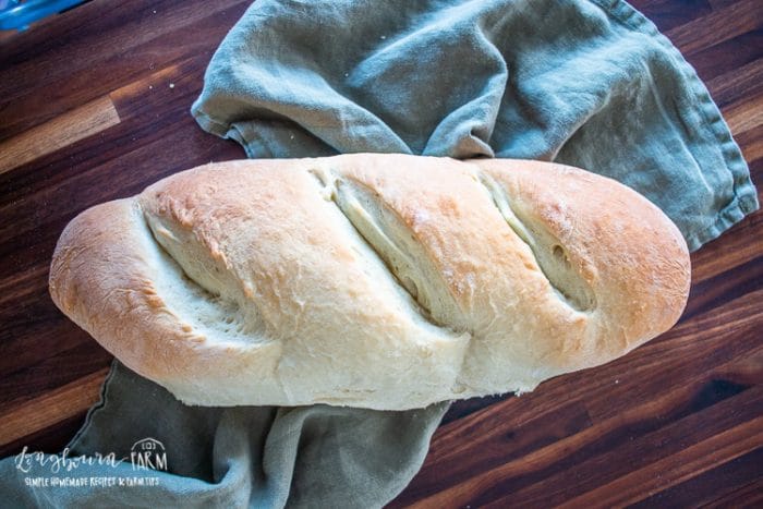 baked french bread on a towel
