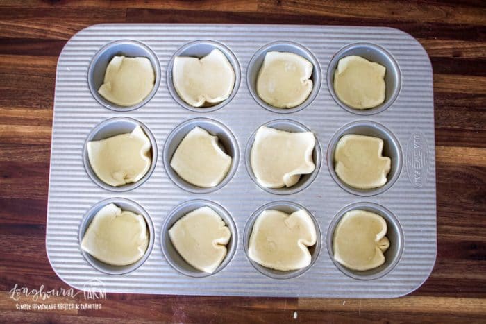 pastry squares in a muffin pan