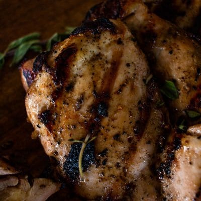 upclose view of grilled chicken thighs