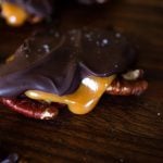 a side view of gooey caramel from homemade turtle candy