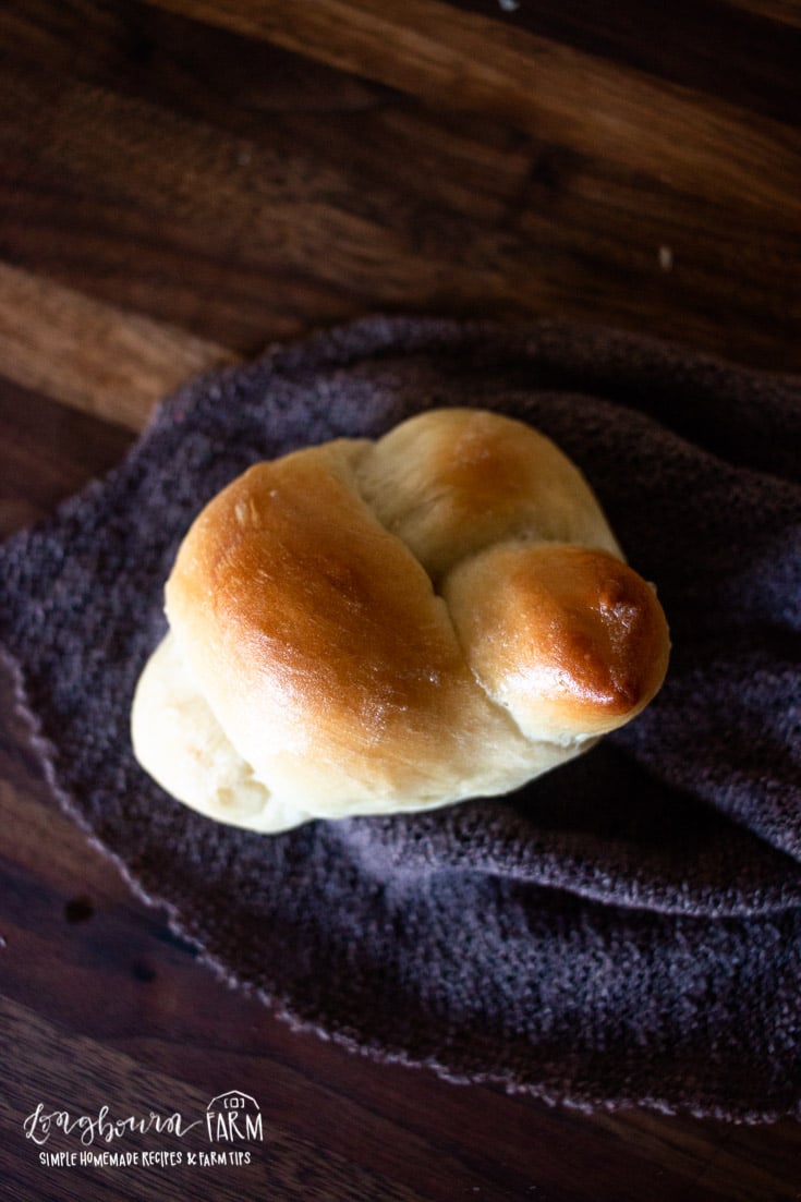 twisted bread roll baked and placed on cloth