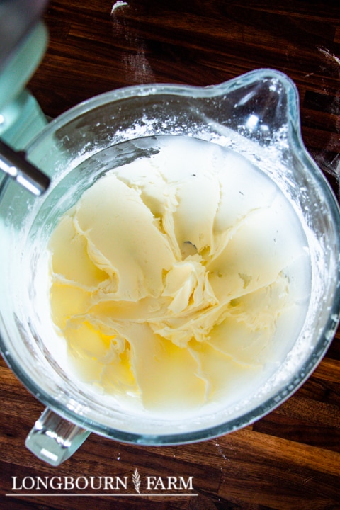 creamed butter and sugar in a glass measuring bowl